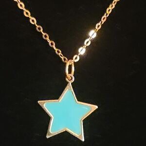 Used in excellent condition solid 14K YG Turquoise Star adjustable necklace.